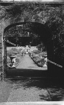 DUNSANY CASTLE GARDEN THROUGH GATE WITH VICTORIA DE RUTZEN AND 